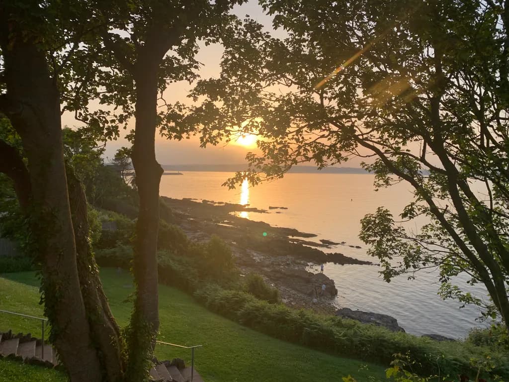 Sunset Over Rocky Shore