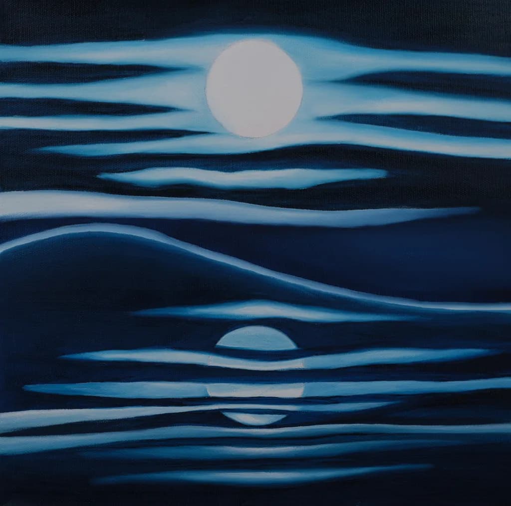 Moonlit Serenity: A Tranquil Dance of Light and Shadow in Deep Blue Hues