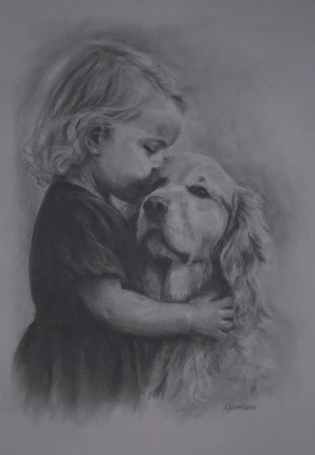 Tender Moments: A Heartfelt Embrace Between Child and Golden Retriever