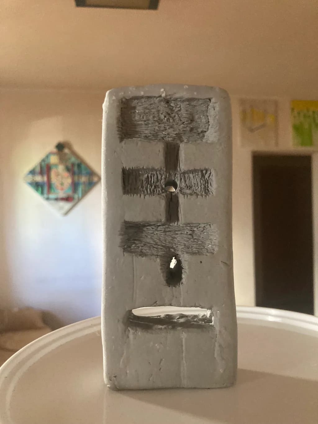 Abstract Concrete Sculpture: A Minimalist Exploration of Form and Texture
