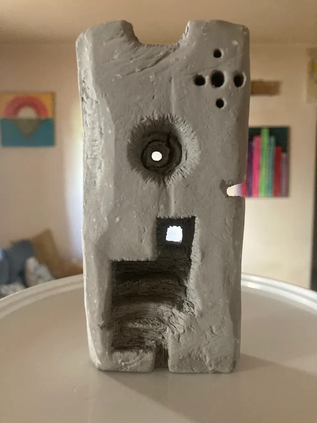 Whispers of Texture: An Abstract Gray Sculpture Exploring Form and Space