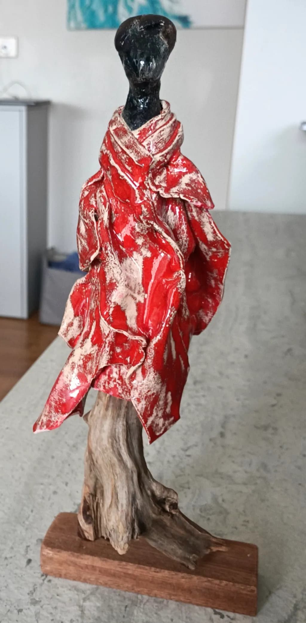 Red Cloaked Figure