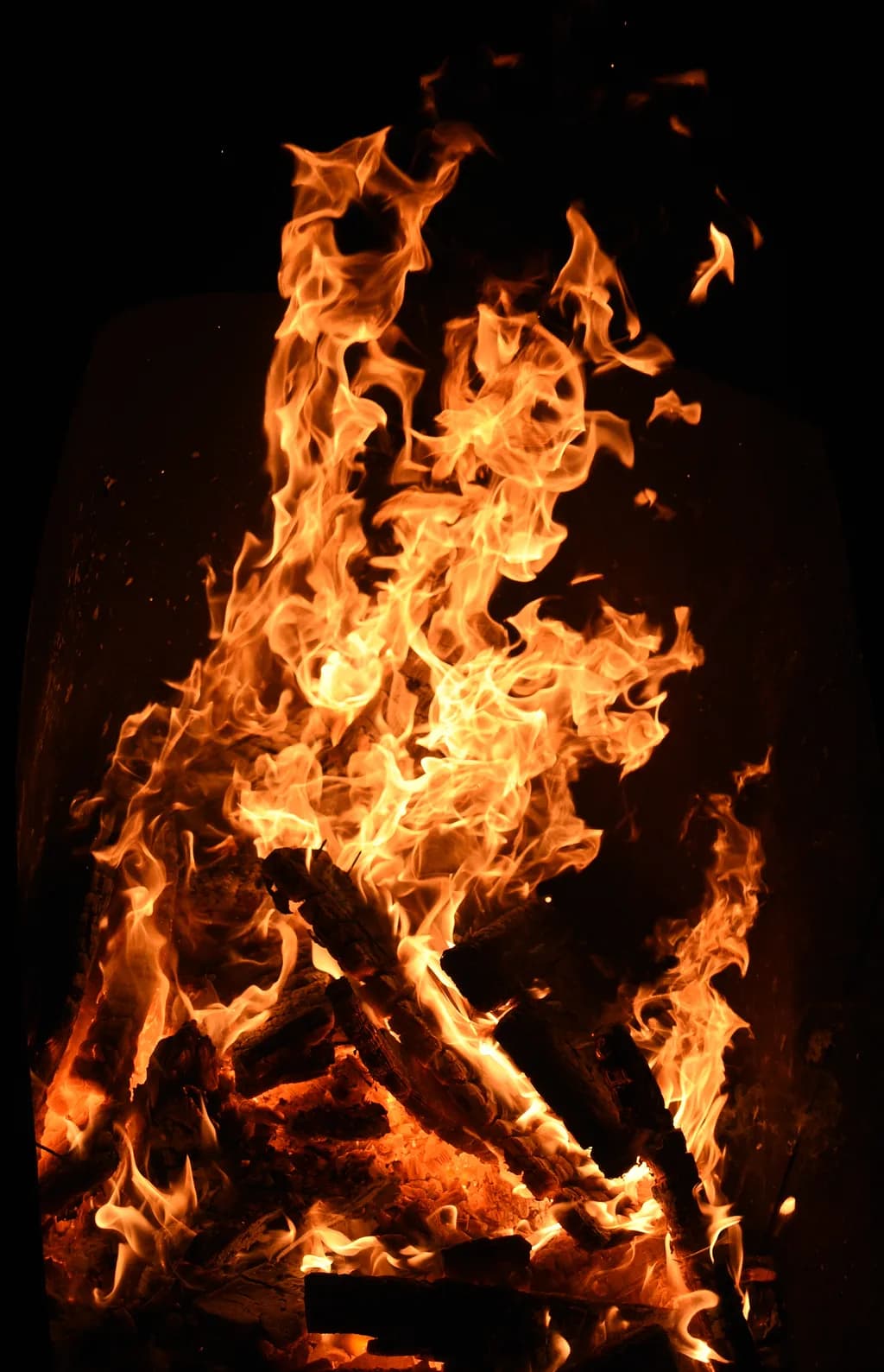 Embers of Night: A Dance of Flames and Wood