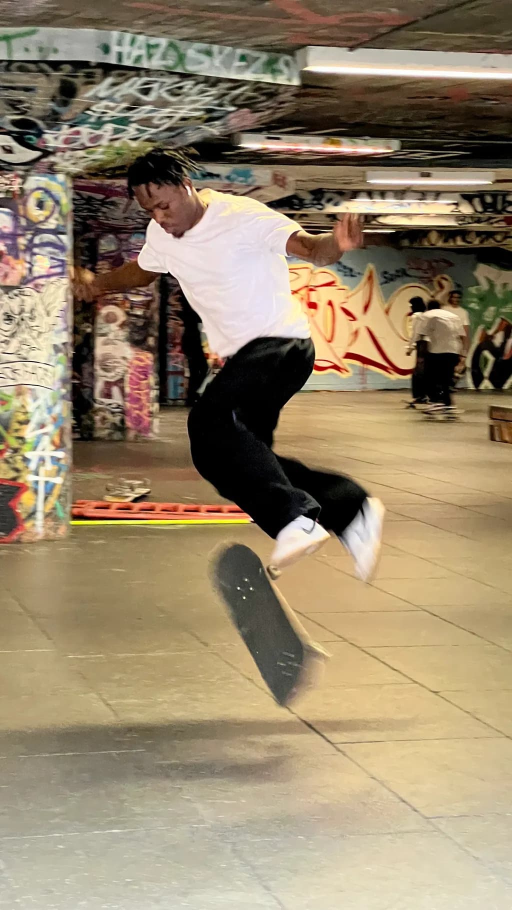 Urban Flight: A Skateboarder's Dance in the Graffiti Jungle