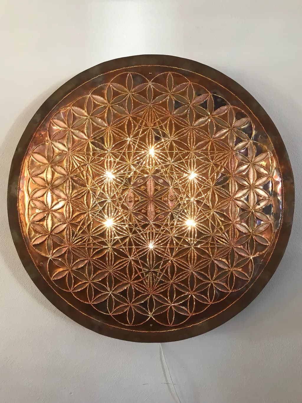 Radiant Harmony: A Stunning Flower of Life Wall Light That Brightens Your Space!