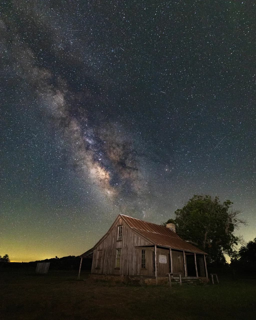 Whispers of the Cosmos: A Rustic Cabin Beneath the Milky Way's Embrace