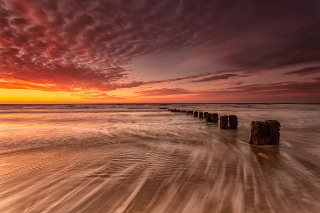 Sunset Over Beach Posts