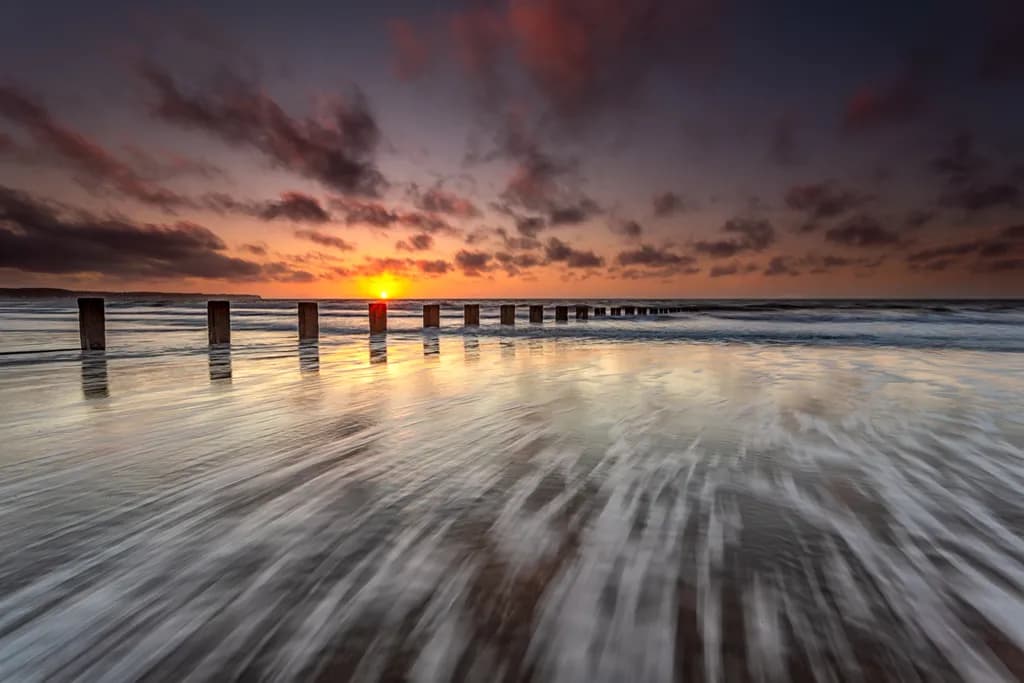 Sunset Over Ocean Posts