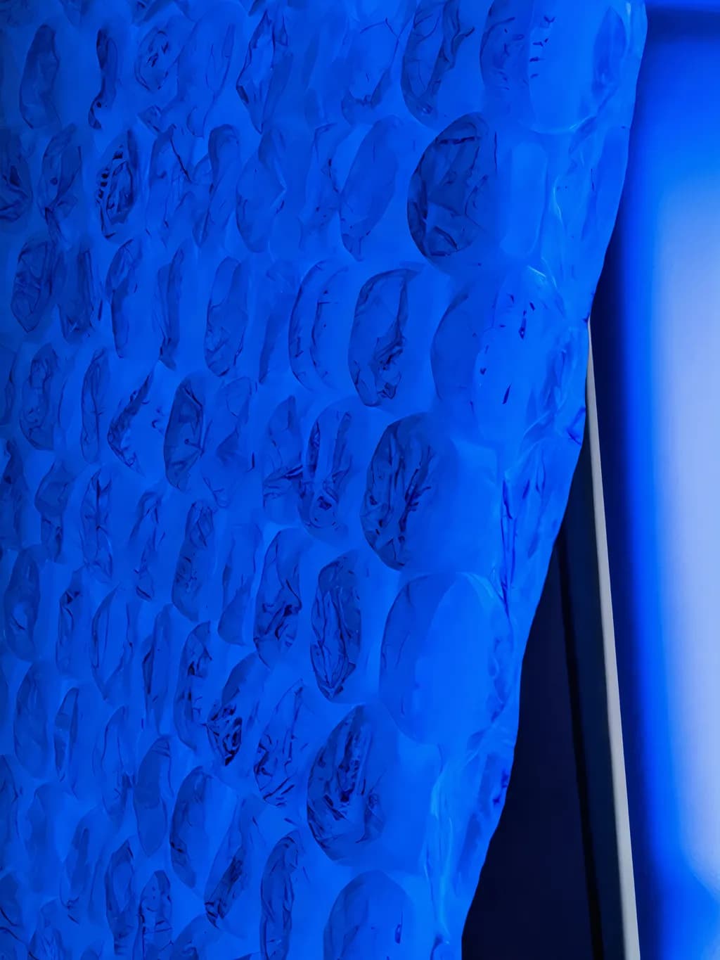 Translucent Blue Harmony: An Abstract Exploration of Light and Texture
