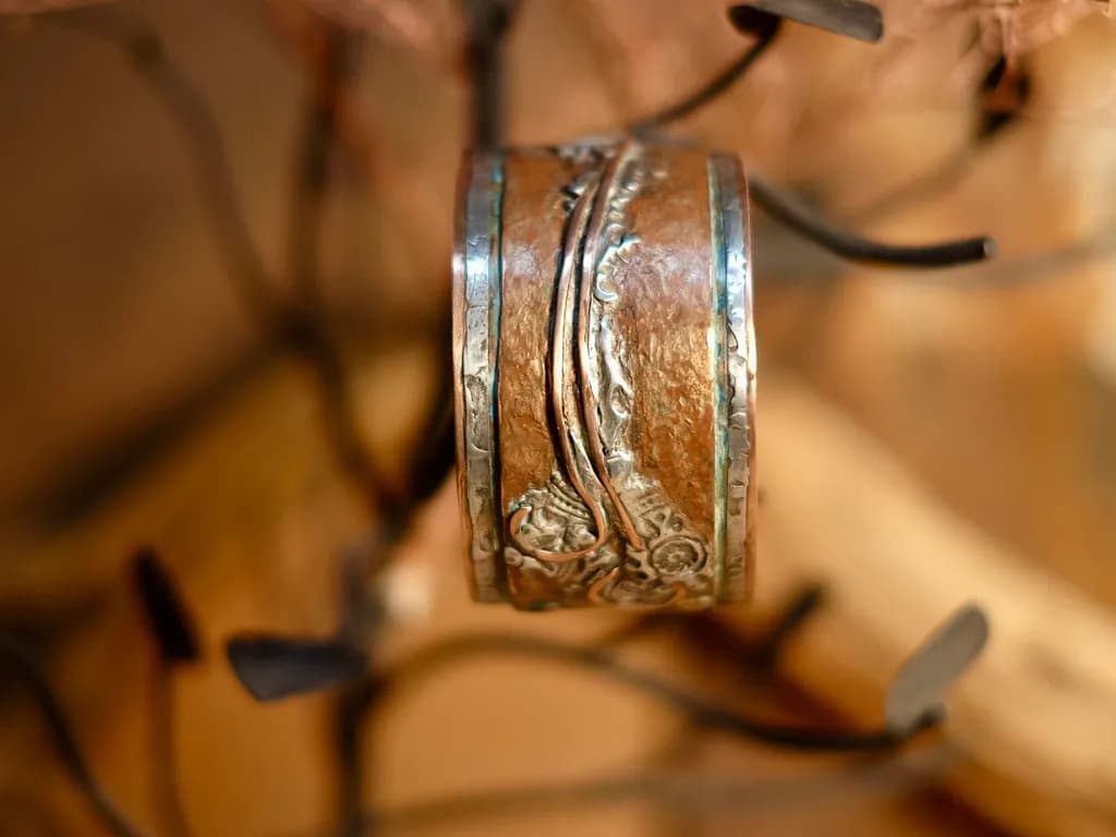 Elegant Fusion: Handcrafted Silver and Copper Ring with Intricate Detailing