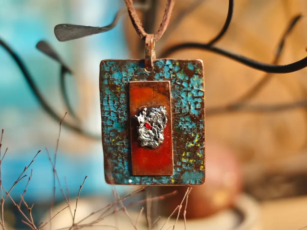 Rustic Elegance: Handcrafted Mixed Media Pendant with Textured Patina and Silver Accent