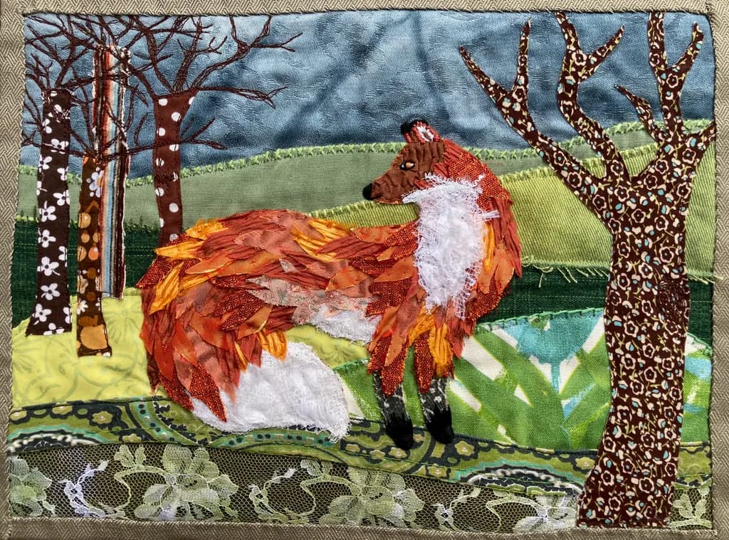 Whimsical Fox in Autumn's Embrace: A Textile Art Journey Through Nature