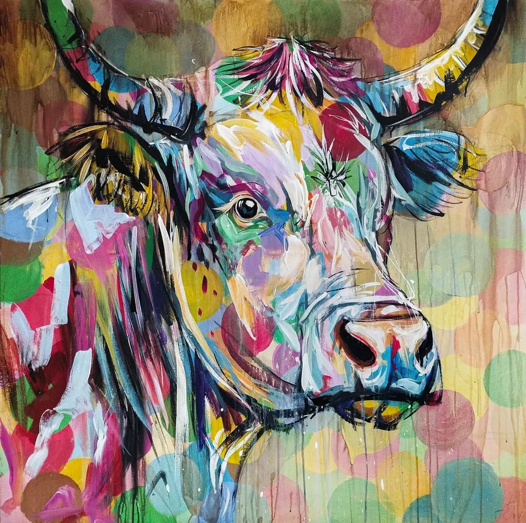 Vibrant Whimsy: A Colorful Cow Portrait Amidst Playful Dots