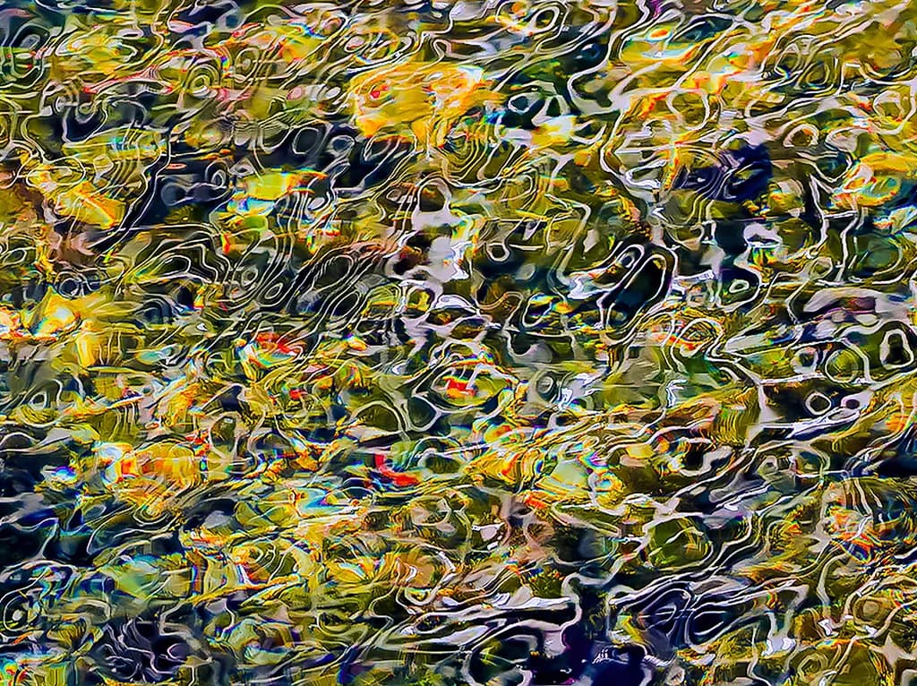 Rippling Reflections: A Colorful Dance of Water and Light