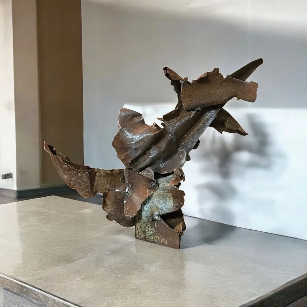 Dynamic Metal Sculpture: A Modern Abstract Design in Rusted Elegance