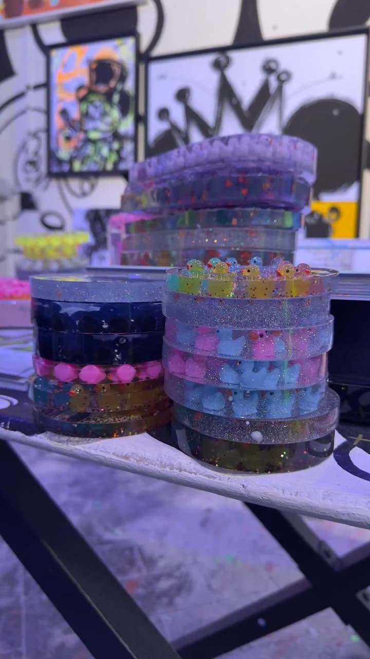 Colorful Unity: A Celebration of Joyful Rubber Ducks in Glittering Resin Containers