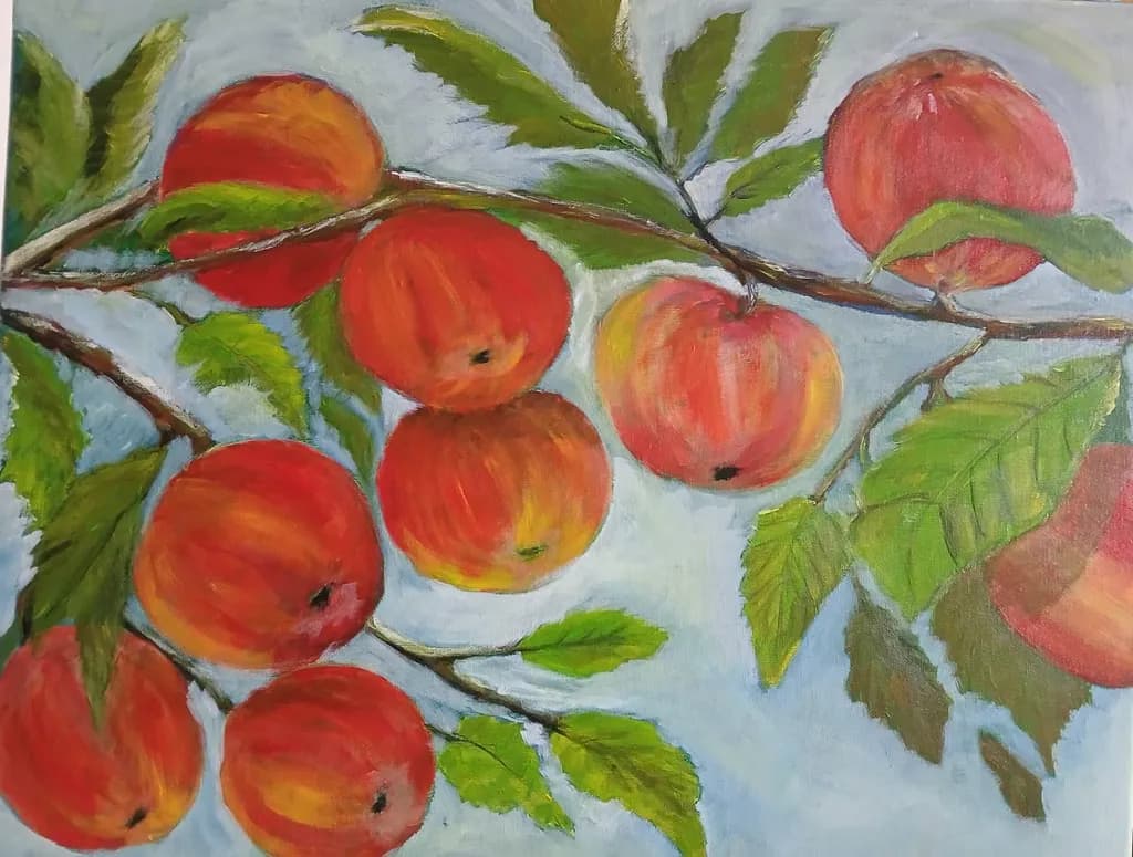 Vibrant Orchard: A Lush Display of Ripe Apples and Green Leaves