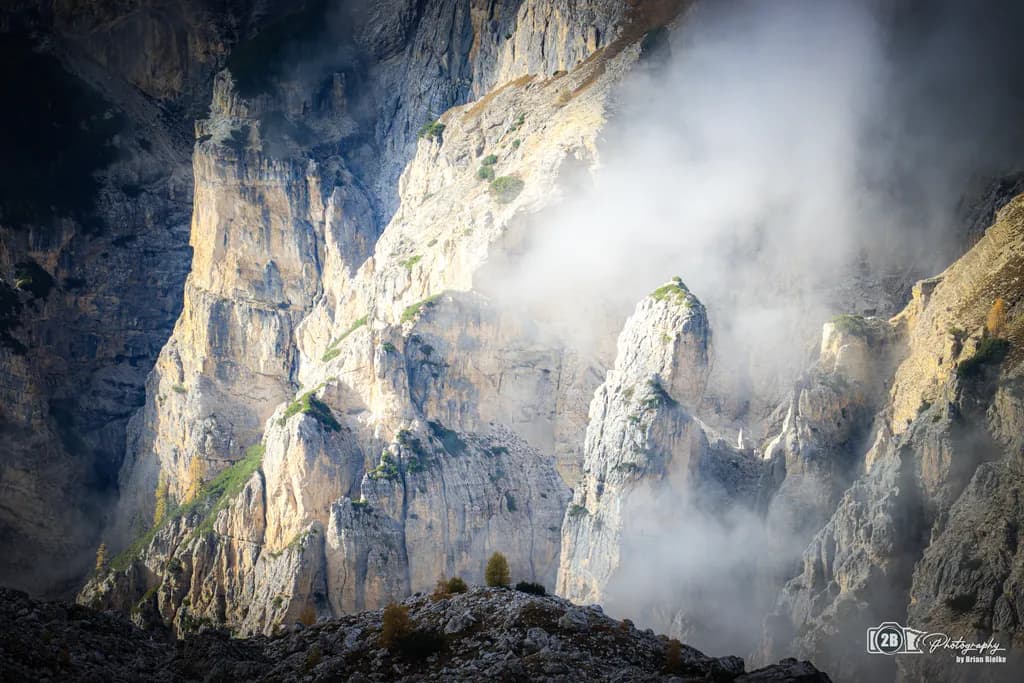 Whispers of the Dolomites—Where Mist Meets Stone in a Dance of Light and Shadow