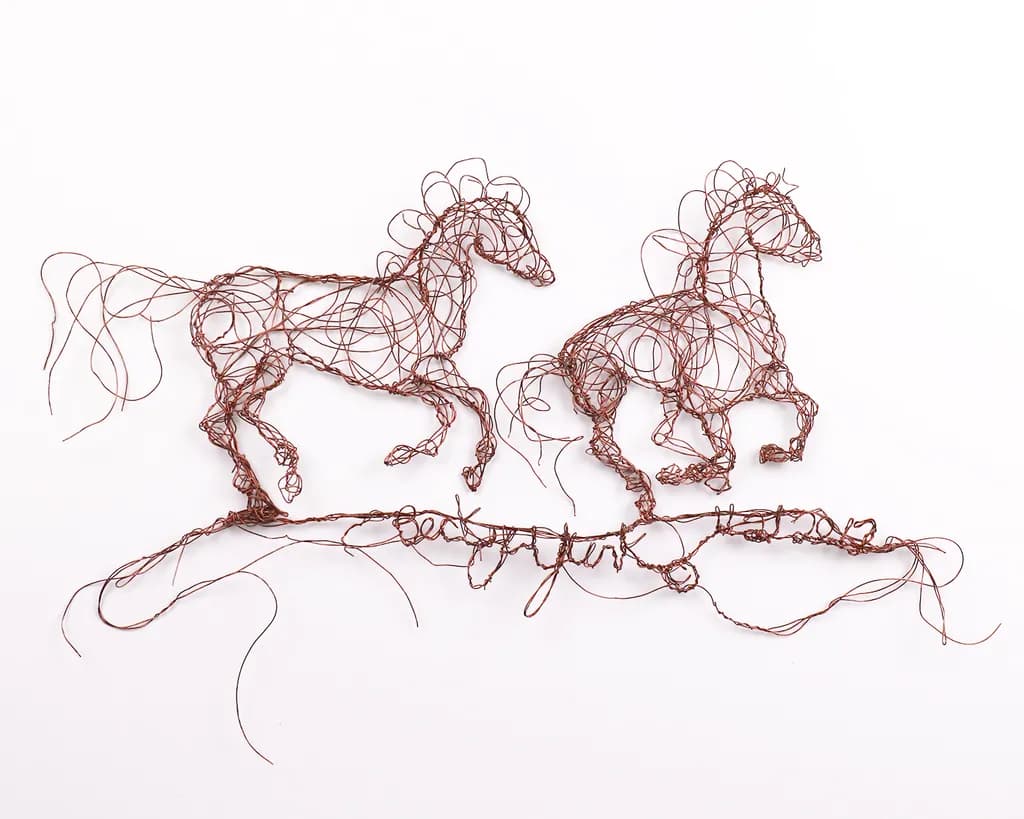 Dancing in the Wind: Copper Wire Horses in Motion
