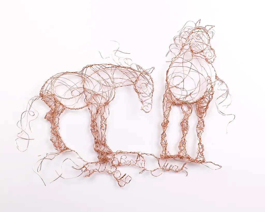 Whispers of Equine Grace: Copper Wire Horses in Motion