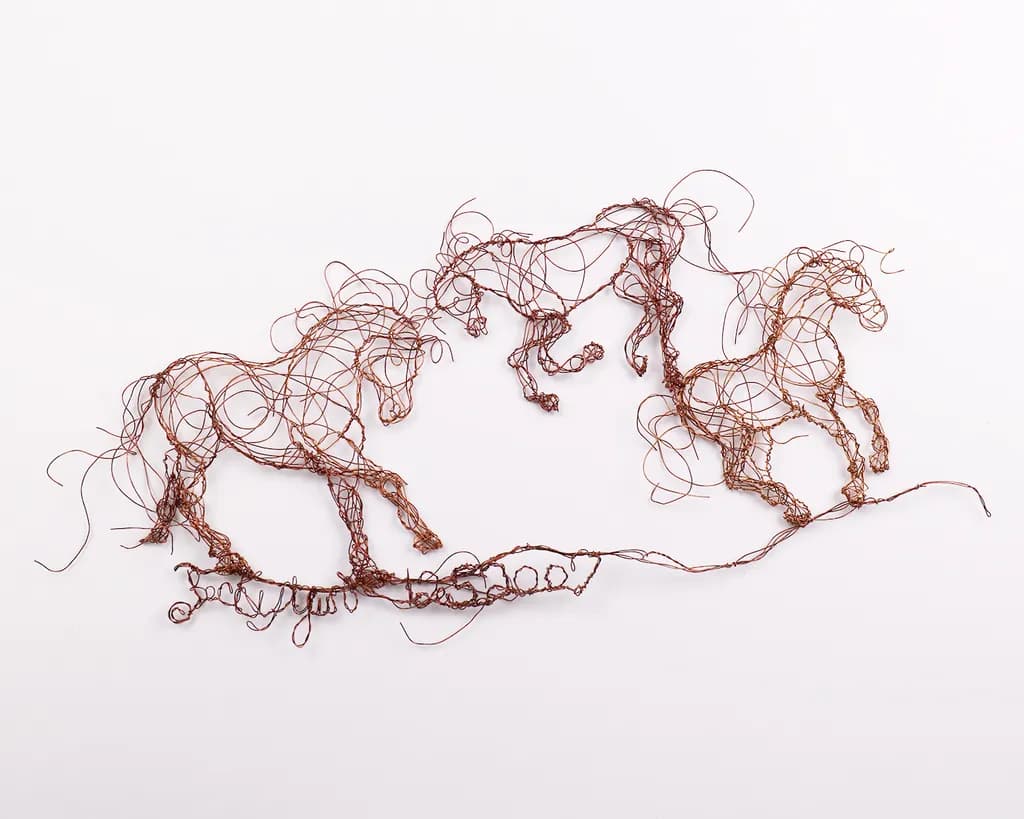 "Graceful Gallop: Copper Wire Horses in Motion"