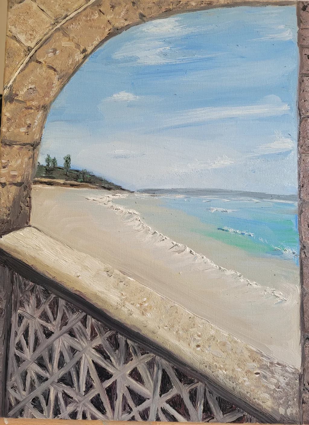 Serene Coastal View Through an Archway: A Tranquil Escape to Nature's Beauty