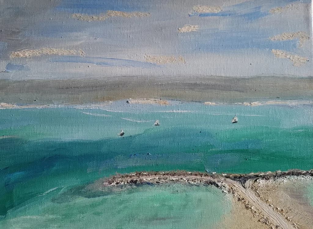 Serenity at Sea: A Tranquil Landscape of Boats and Sky