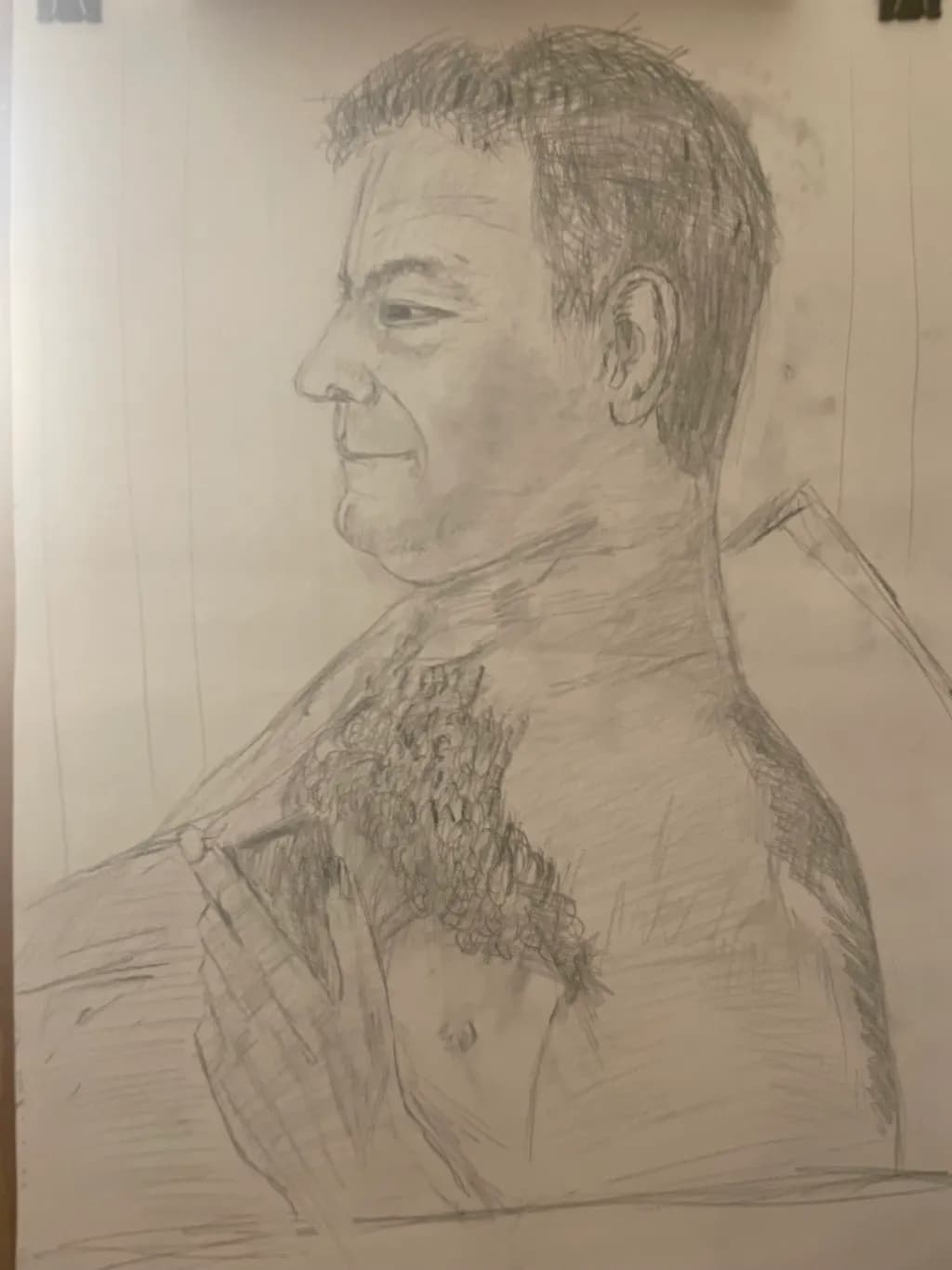 Expressions of Strength: A Portrait Sketch of Masculinity and Emotion