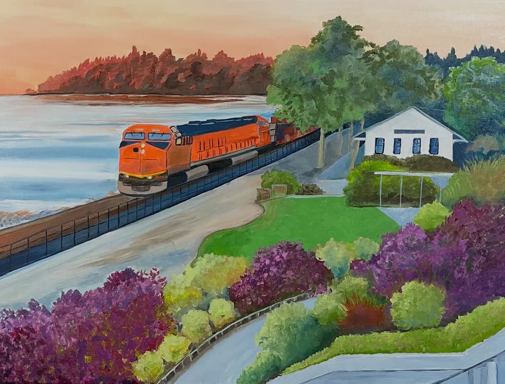 Sunset Journey: A Train's Passage Through Vibrant Landscapes and Tranquil Waters