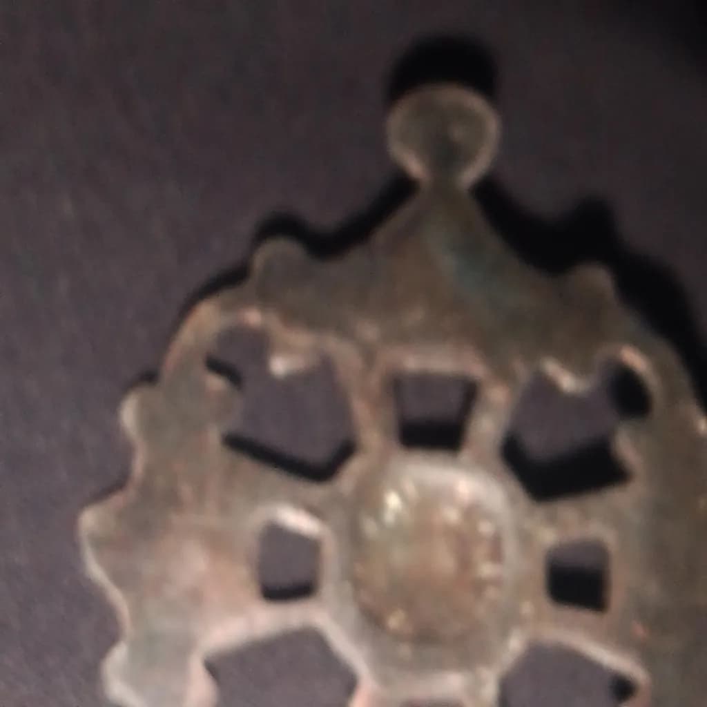 Whispers of Time: An Intricate Vintage Metal Ornament