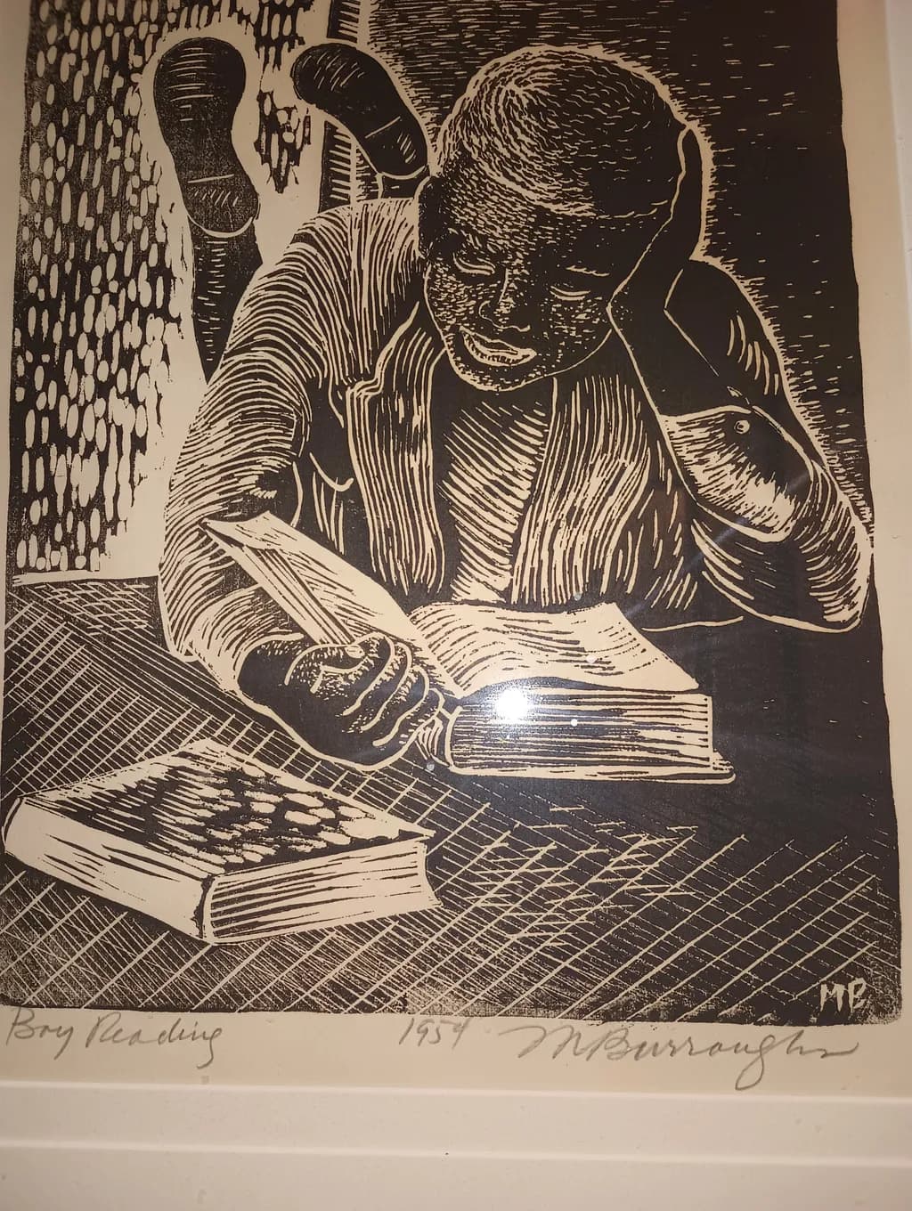 A Journey Through Pages: The Contemplative Boy Reading