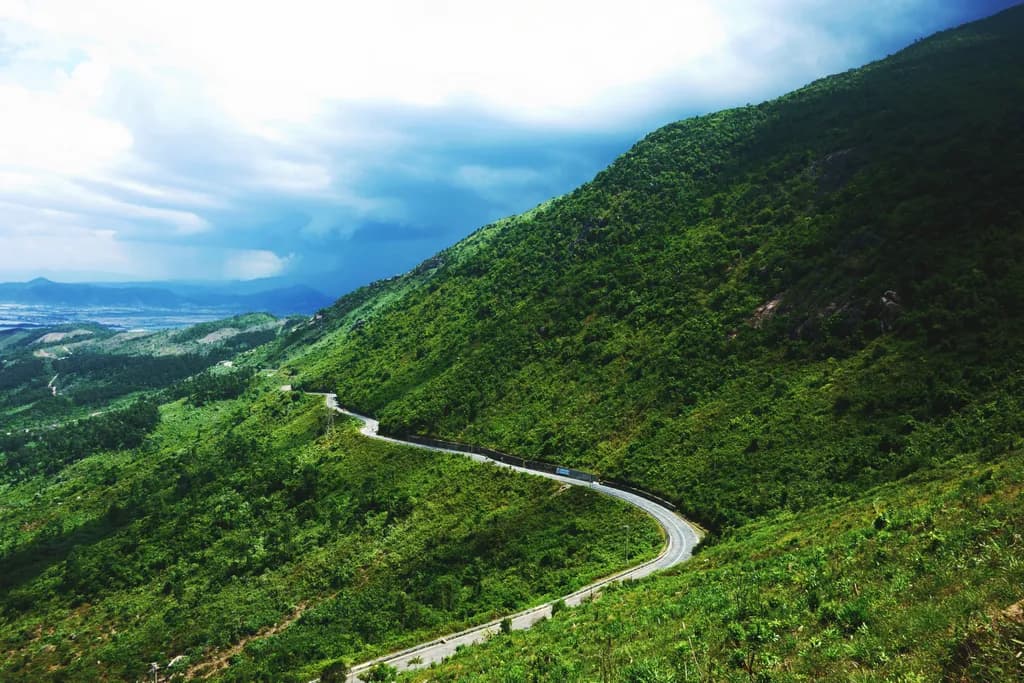 Whispers of the Curvy Road: A Scenic Journey Through Mountainous Greenery