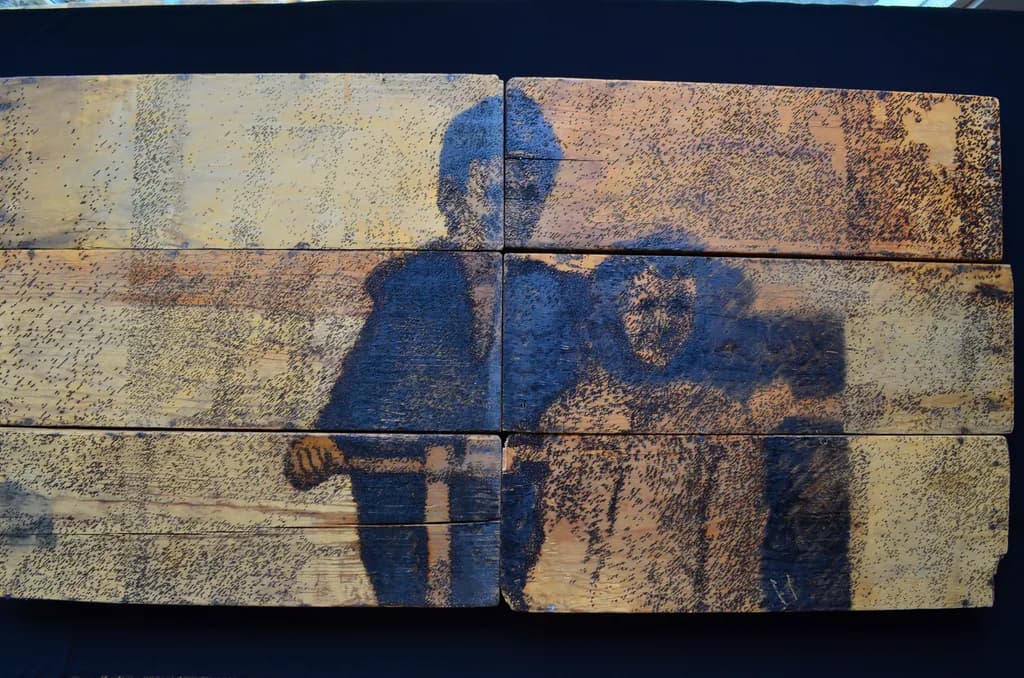 From the series Portraits of Nameless Families. Burned drawing on recycled wood. 2016