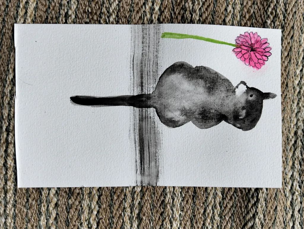 Playful Cat and Flower