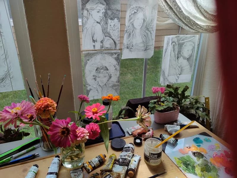 Sketches taped on to the window.