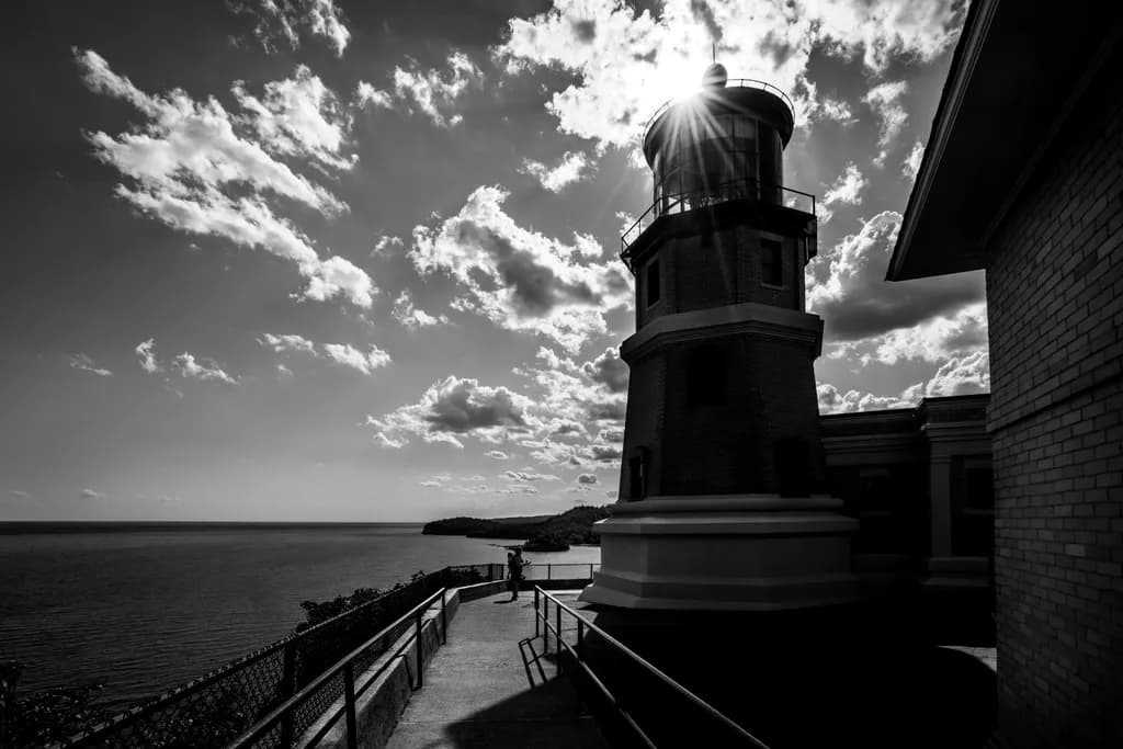 Coastline Lighthouse Sunburst
