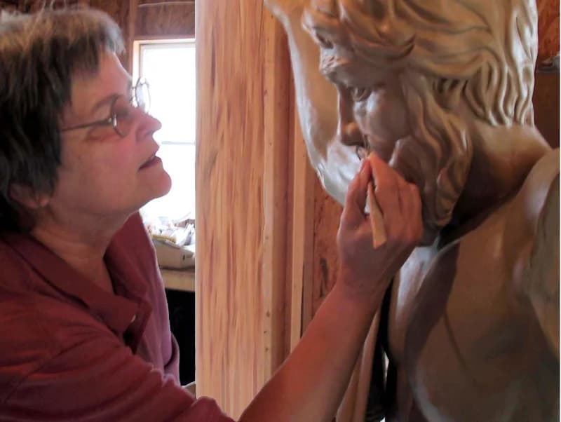 Working on a clay model for a bronze Atlas.