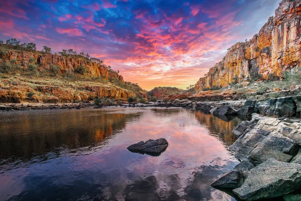 Cliffside Sunset Reflection