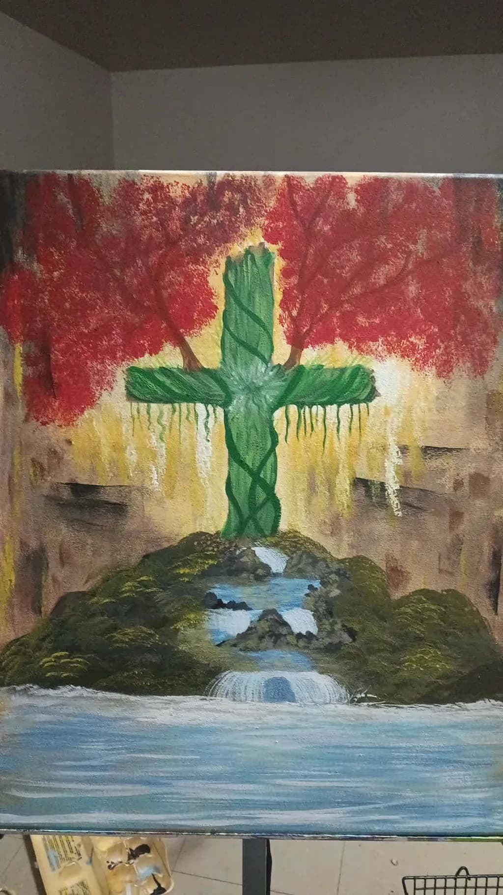 Green Cross by Waterfall