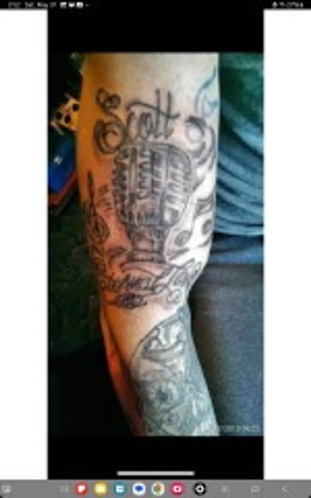 Fist Script Tattoo