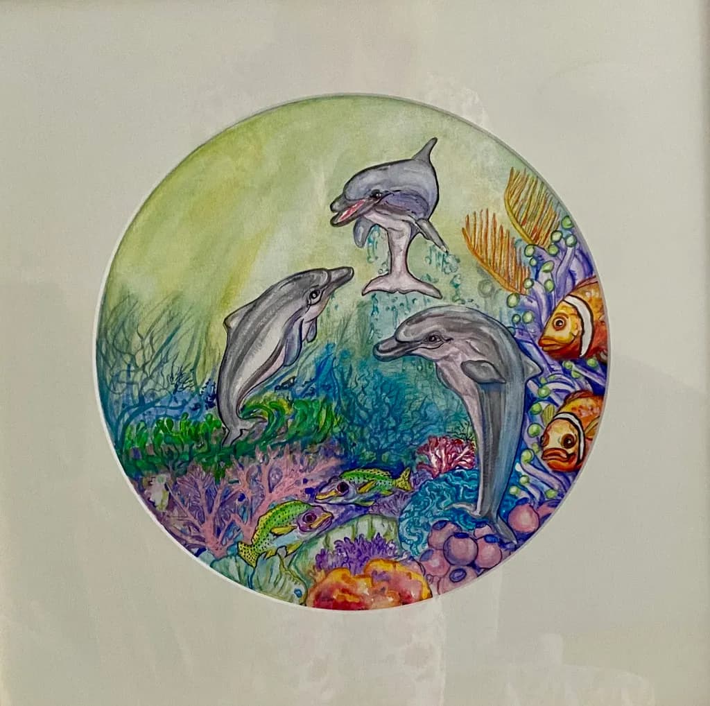 Dolphins in Coral Reef