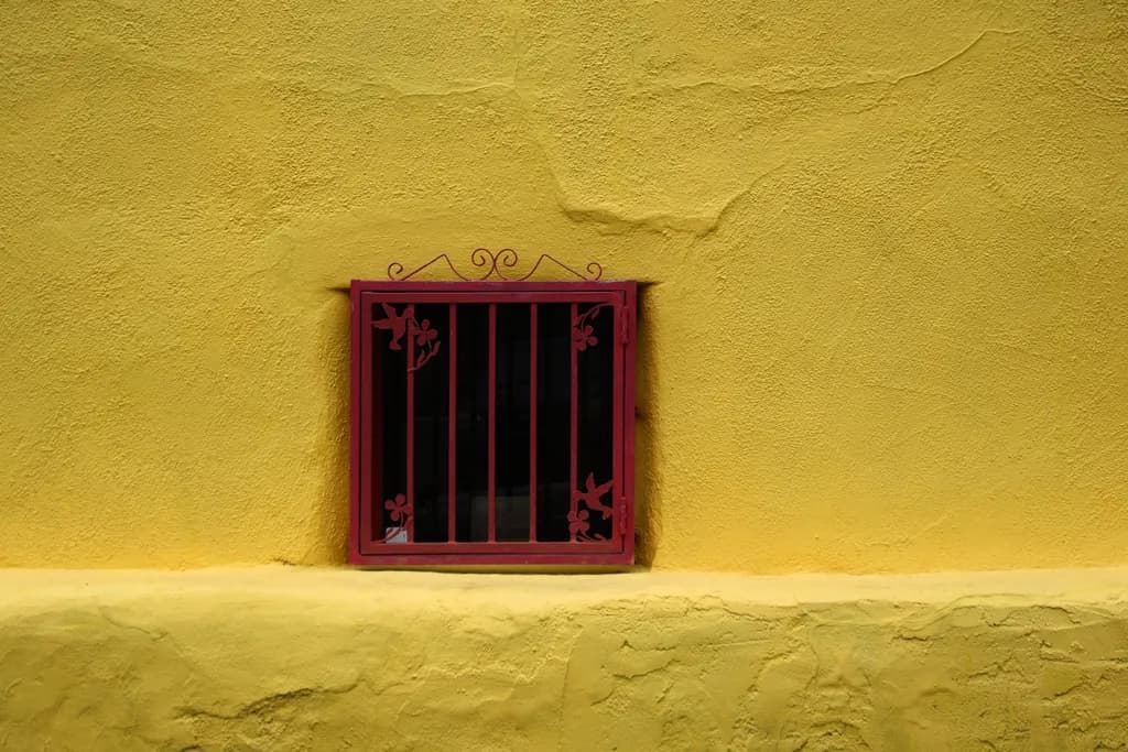 Red Frame on Yellow Wall