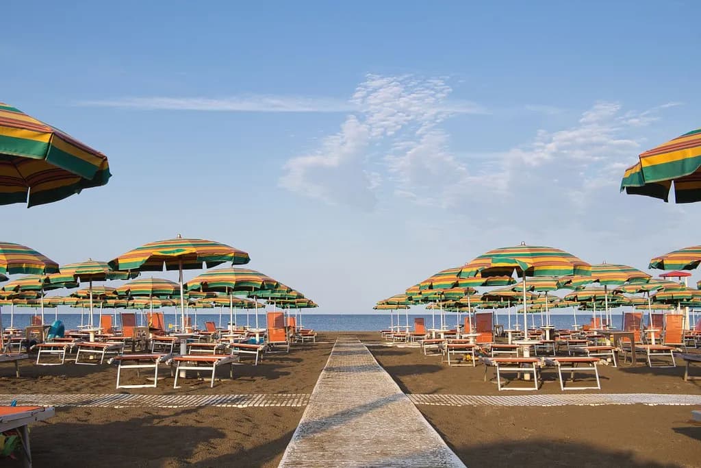 Striped Umbrellas on Beach