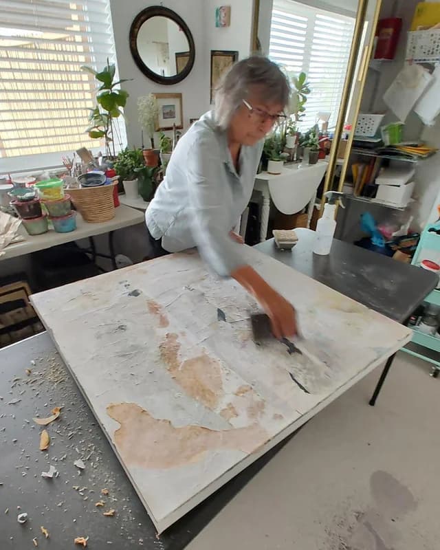 Working on a series using paint, paper and varnish in multiple layers to build texture and depth.