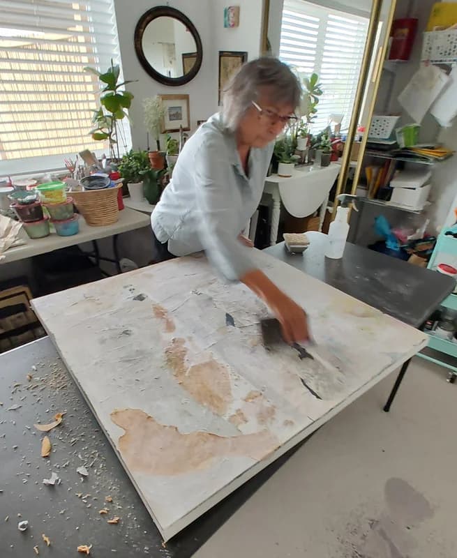 Working on building layers of paint, papers, and varnish. The process evolves gradually through the build up. After multiple layers then the sanding, scraping and peeling back creates texture, depth creating an architectural sense of calm.