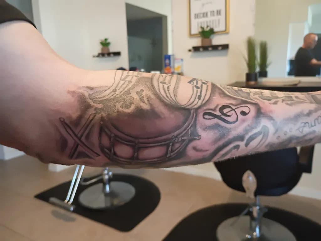 Drum and Music Notes Tattoo