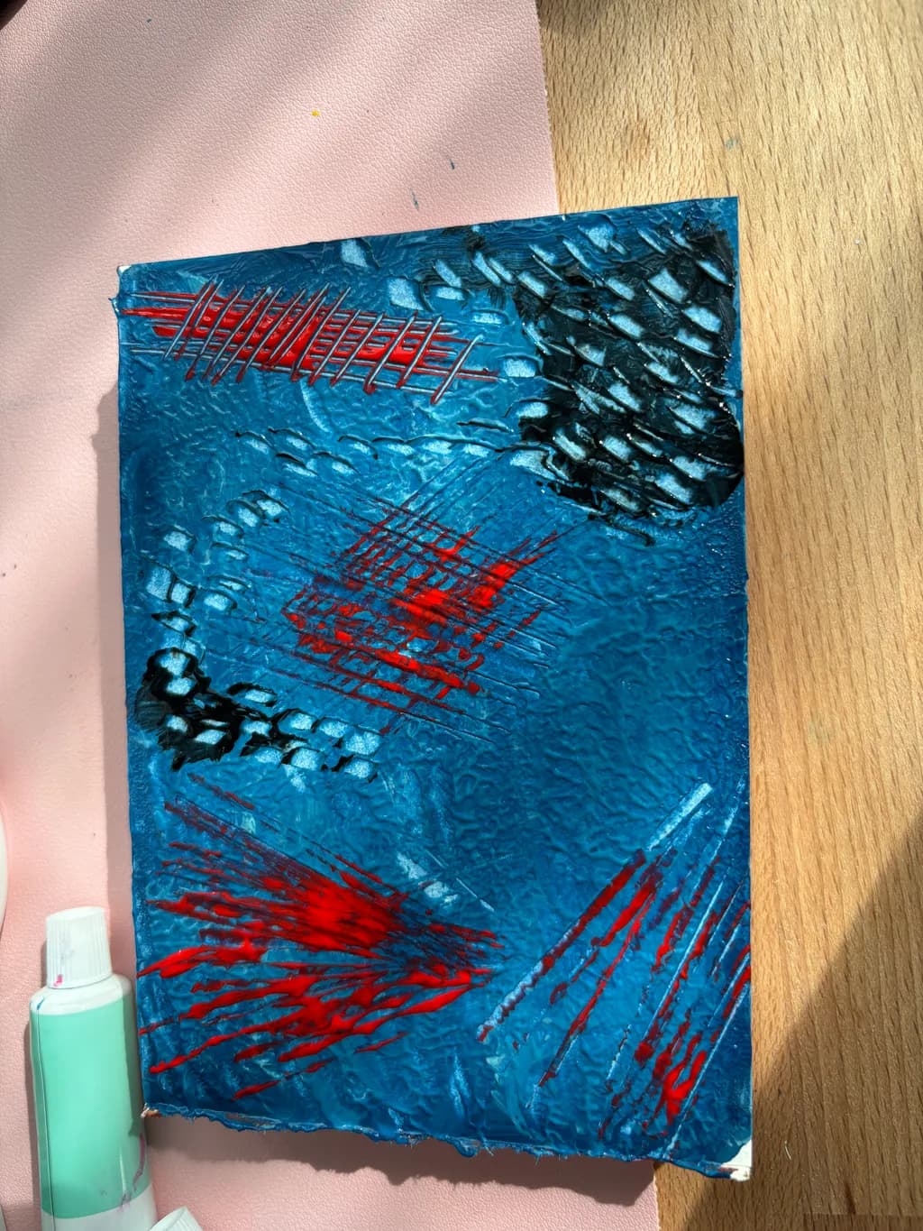 Crimson Streaks on Blue Canvas