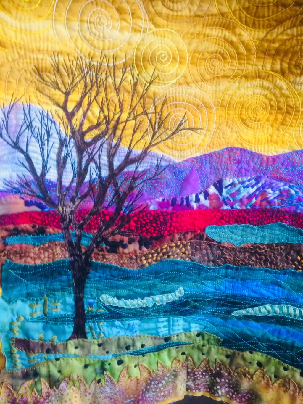 Tree by Colorful Hills