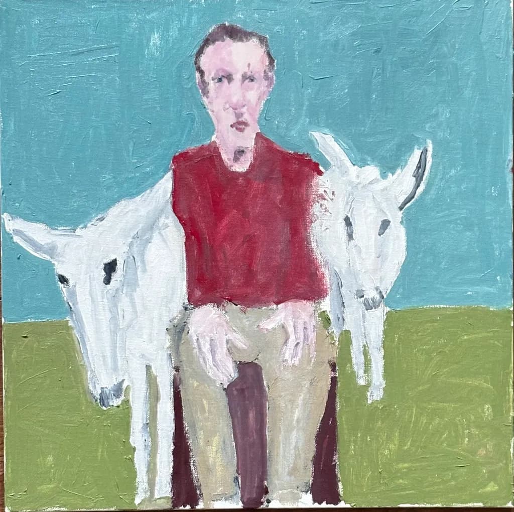 Man with Goats