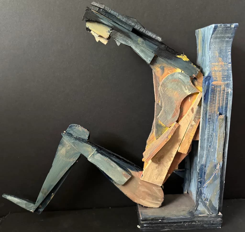 Seated Figure Sculpture